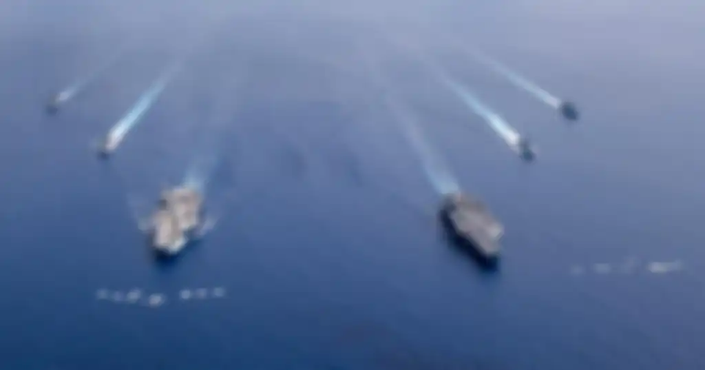 Ilustrasi kapal induk milik Angkatan Laut Amerika Serikat yang bersiap menuju Laut China Selatan.