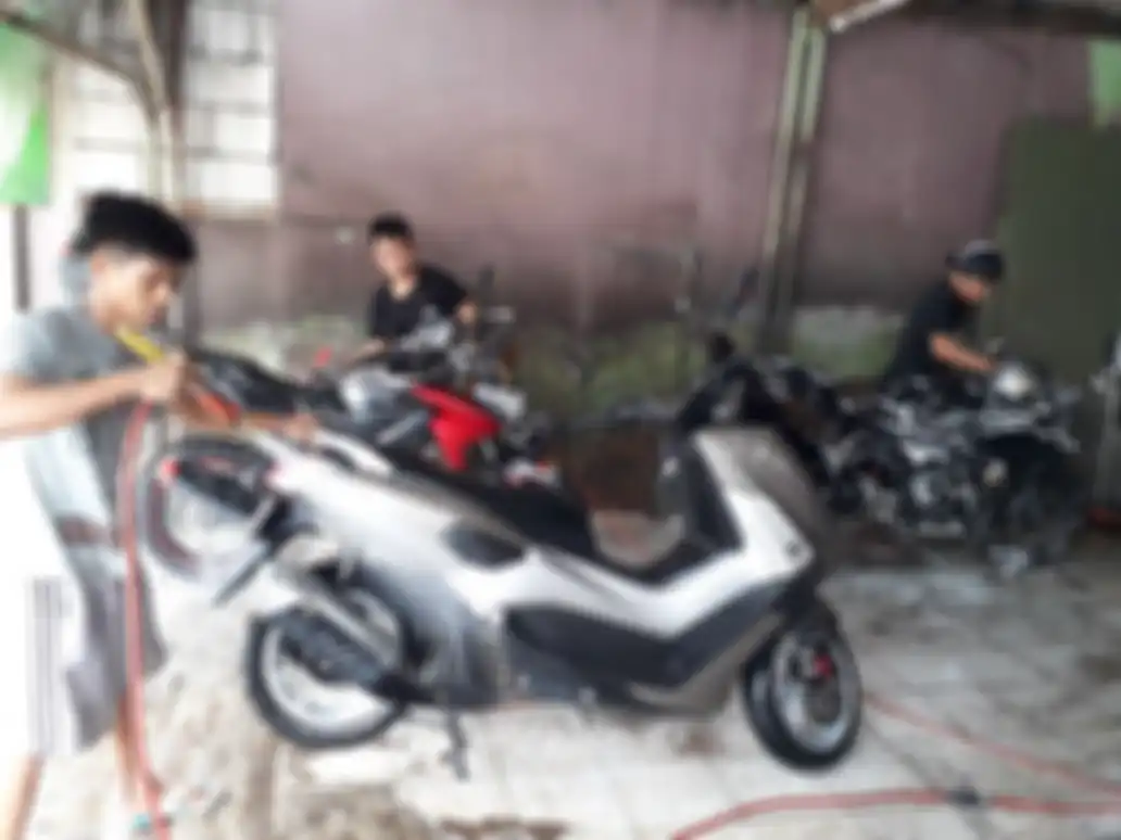Ilustrasi tempat cuci motor.