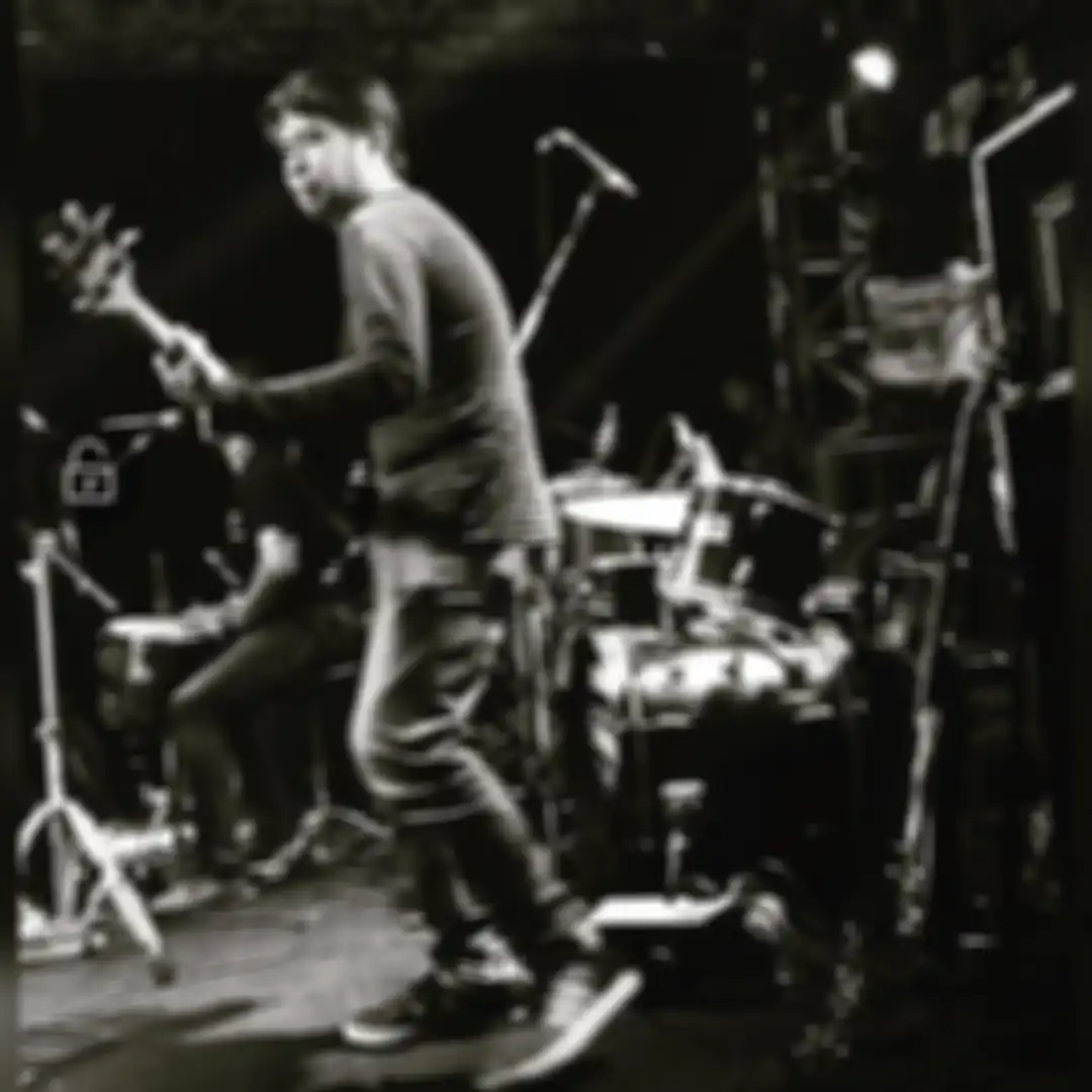 Harry Indra Nugraha saat manggung sebagai bassist.