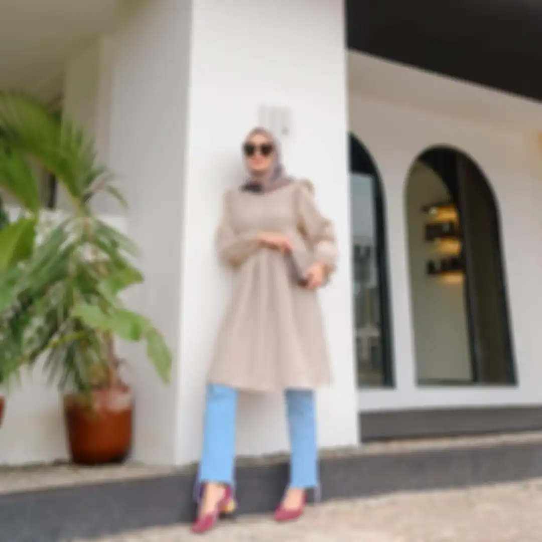 Tunik ala Mega Iskanti