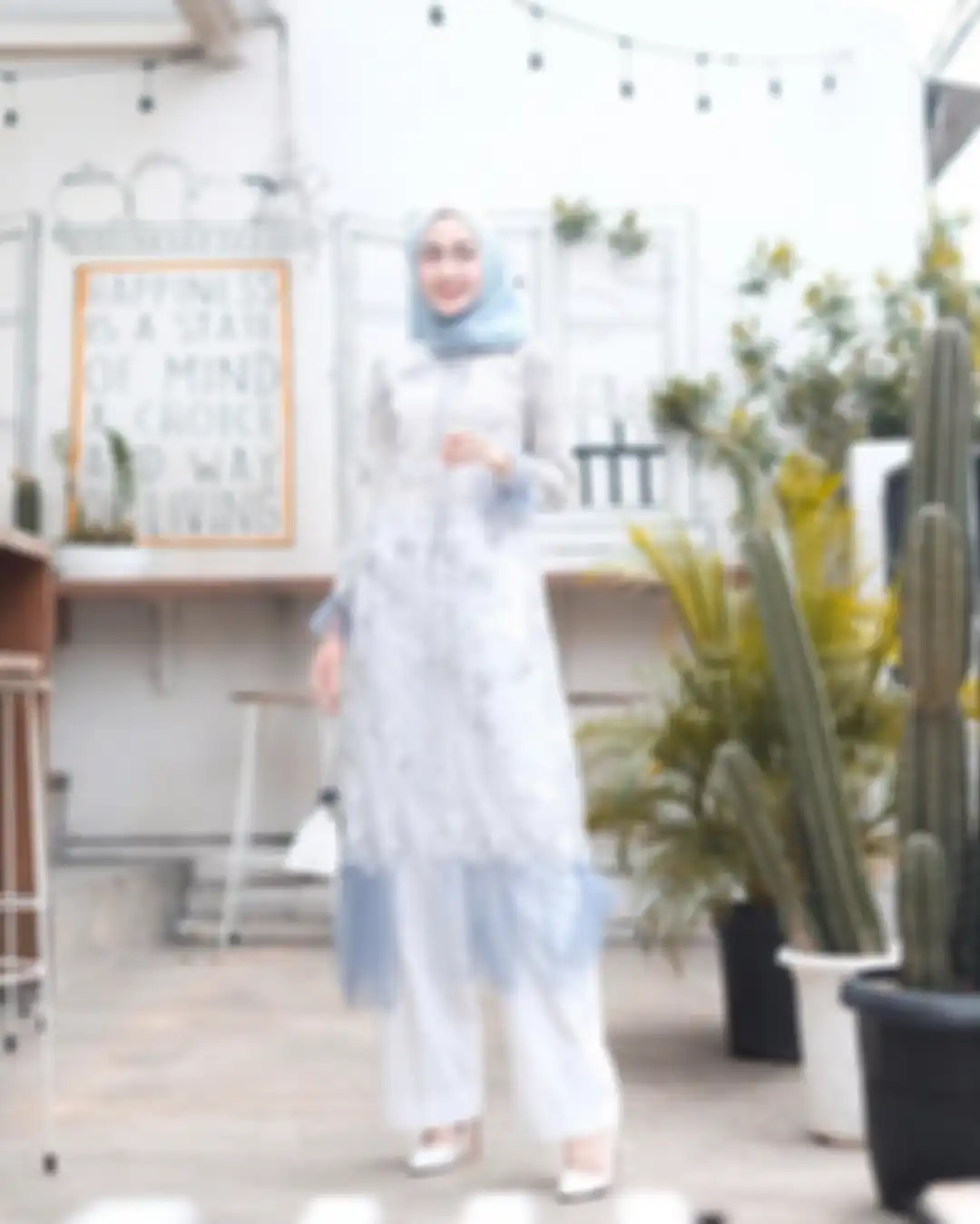 Model tunik buat lebaran ala Sitti Ashari
