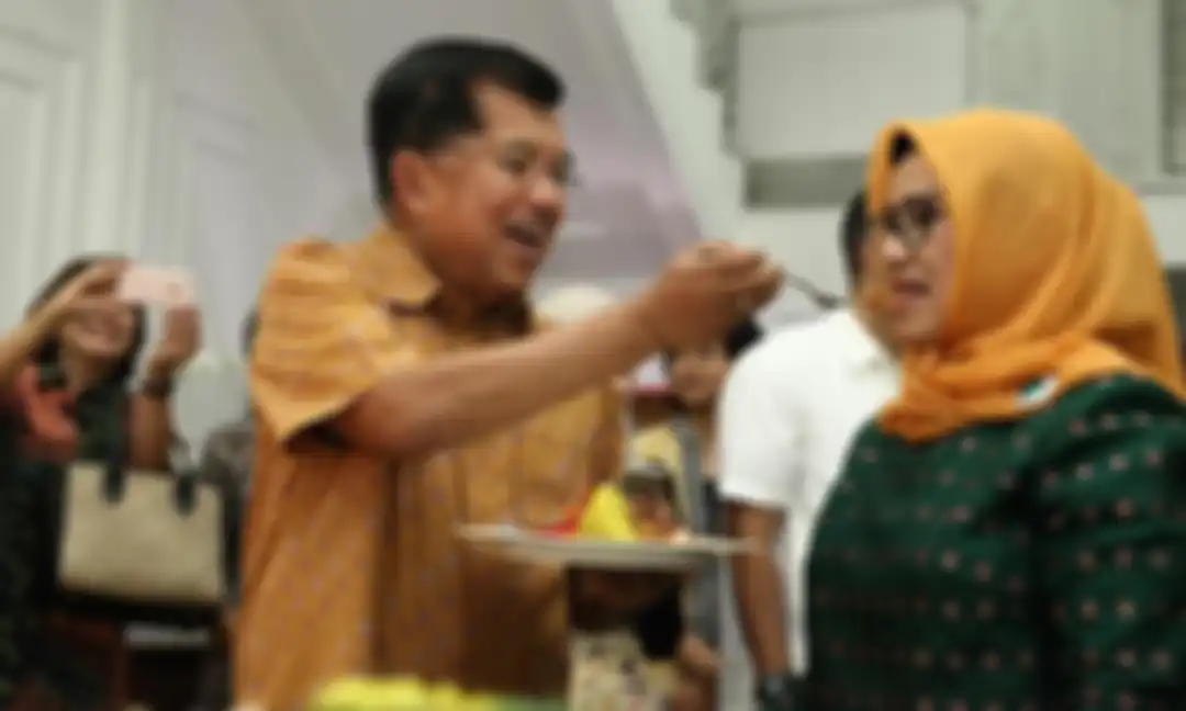 Wakil Preside Jusuf Kalla bersama istrinya, Mufidah Kalla