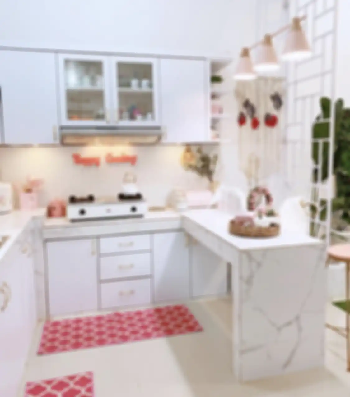 Foto interior desain dapur warna putih terlohat lebih lega karena gaya berbeda. Cocok buat pemilik rumah minimalis. 