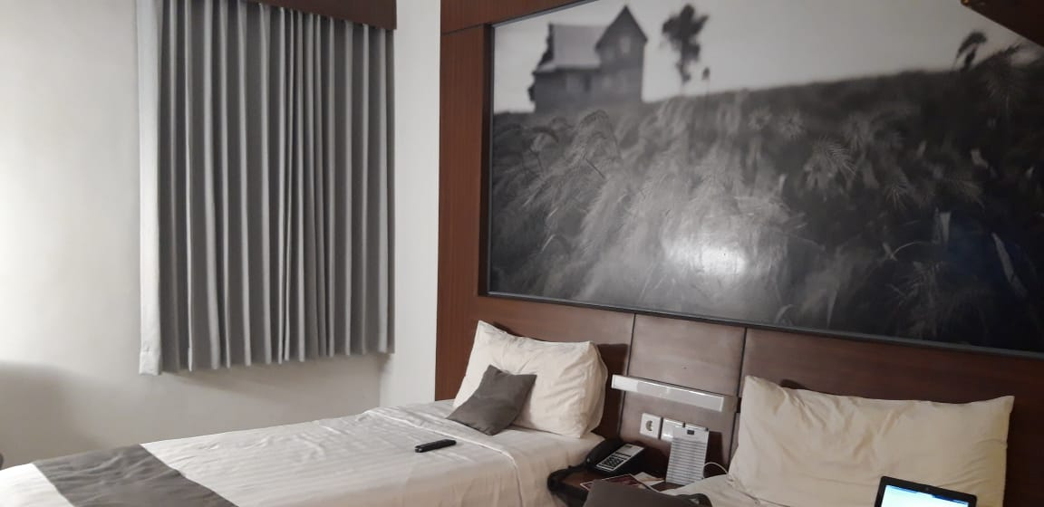 Kamar tidur di Neo Hotel