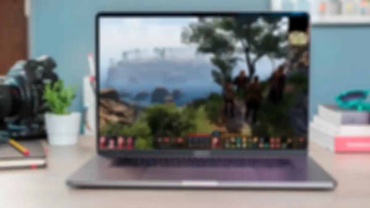 Ilustrasi penggunaan MacBook Pro untuk aktivitas gaming