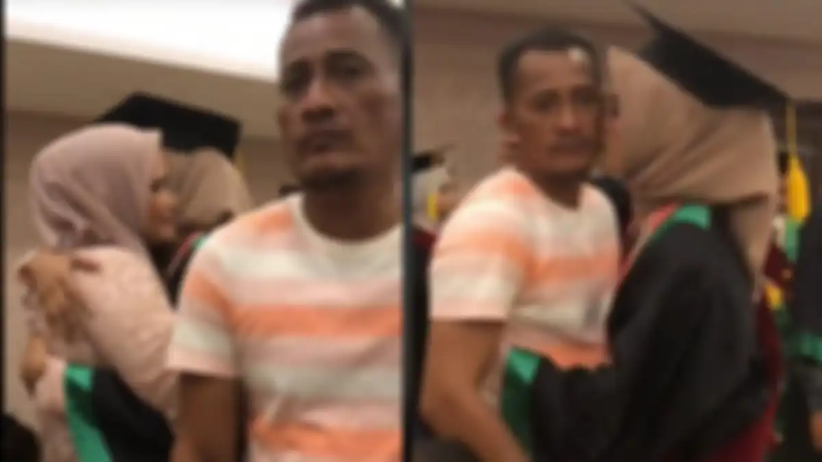 Momen ayah tahan tangis anaknya yang wisuda.