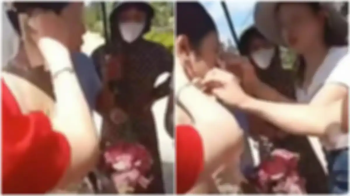 Mempelai wanita kena lemparan lumpu oleh mantan istri dari mempelai pria. 
