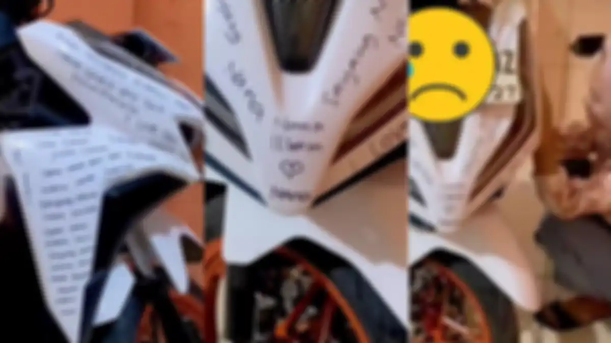 tulisan wanita yang coret body depan motor kekasihnya pakai spidol permanen