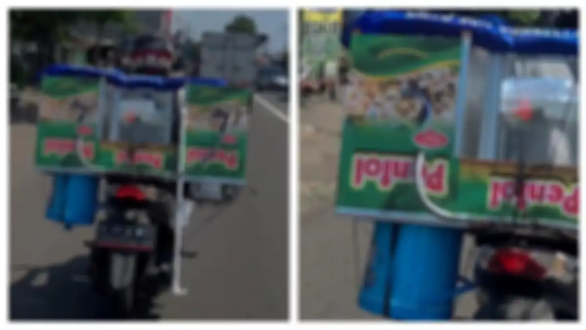 penjual pentol membawa gerobak secara terbalik, videonya viral