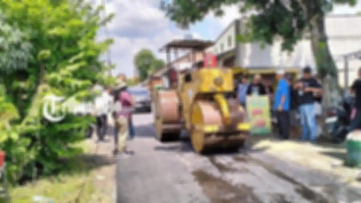 Proses perbaikan Jalan Singopuran, Klodran, Colomadu, Karanganyar.