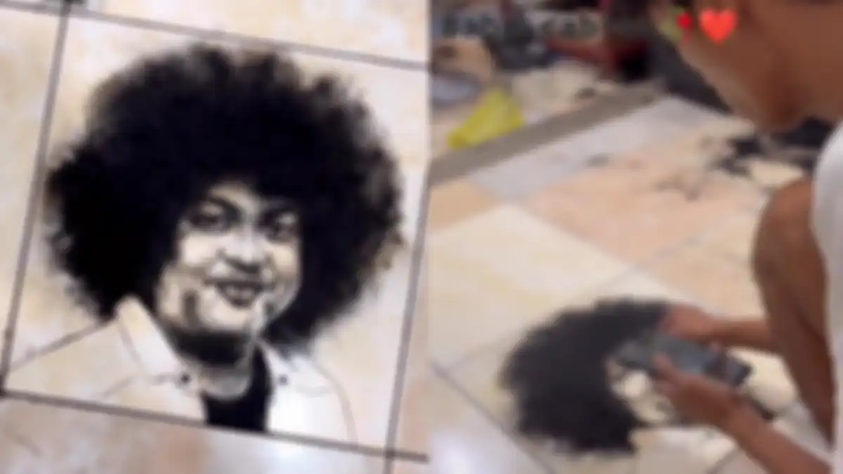 hasil lukisan wajah Almarhum Babe Cabita yang disusun menggunakan potongan rambut oleh tukang cukur