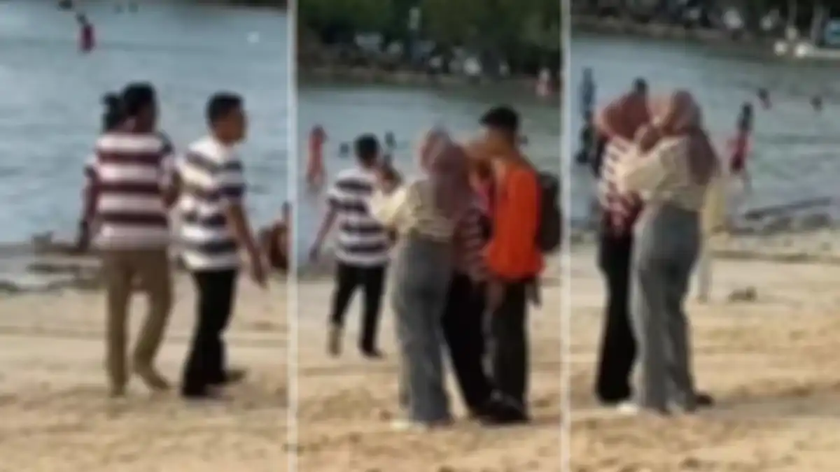 Pemuda tak sengaja pakai baju kembaran dengan wisatawan lain saat liburan di pantai.