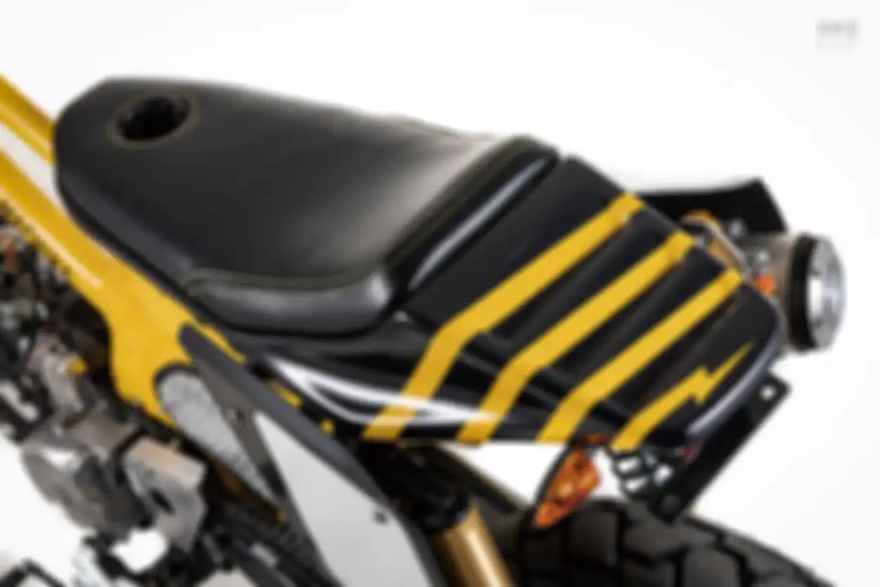 Bagian bodi belakang dan jok Daelim Citi Ace 110 streetcub tracker.