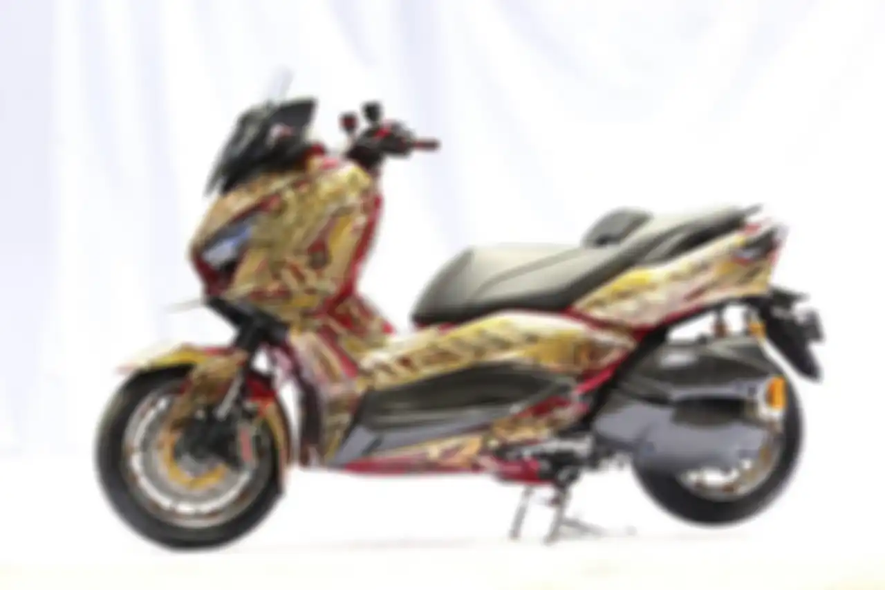 Yamaha XMAX dengan corak grafis unik pemenang best class di grand final customaxi