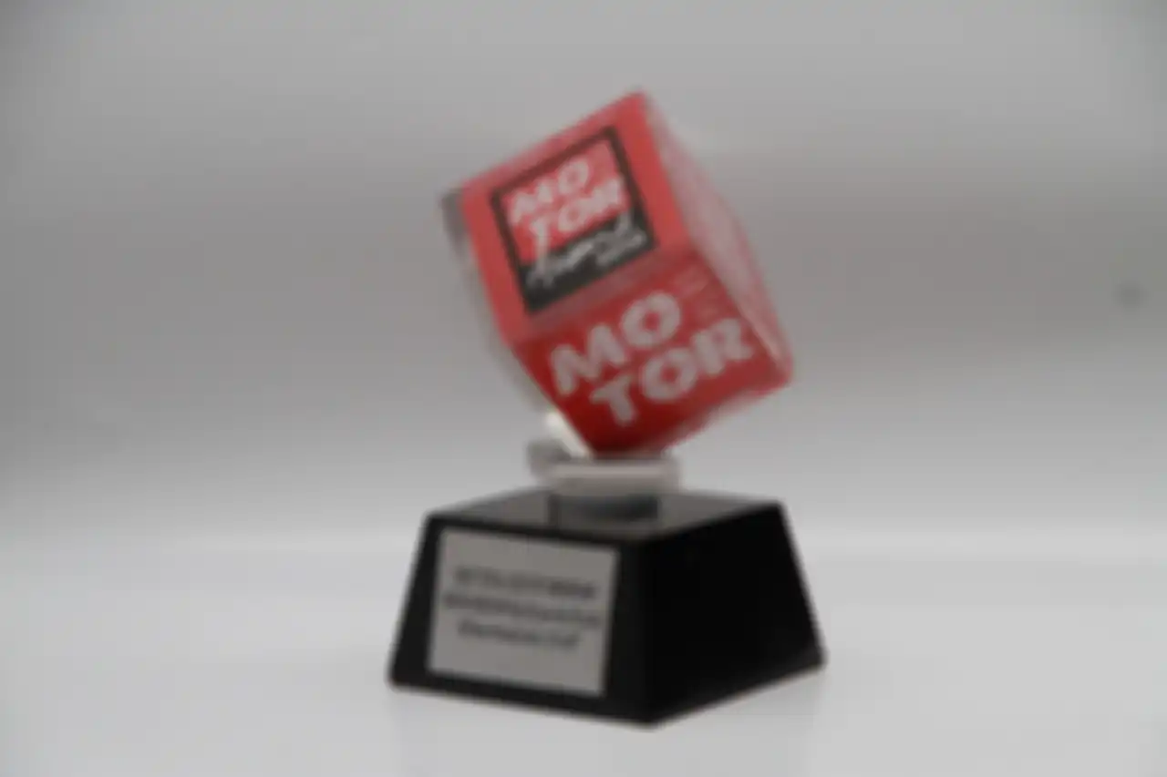 Ilustrasi piala MPA Best Total Cost of Ownership (TCO) di MOTOR Plus Award 2019. 
