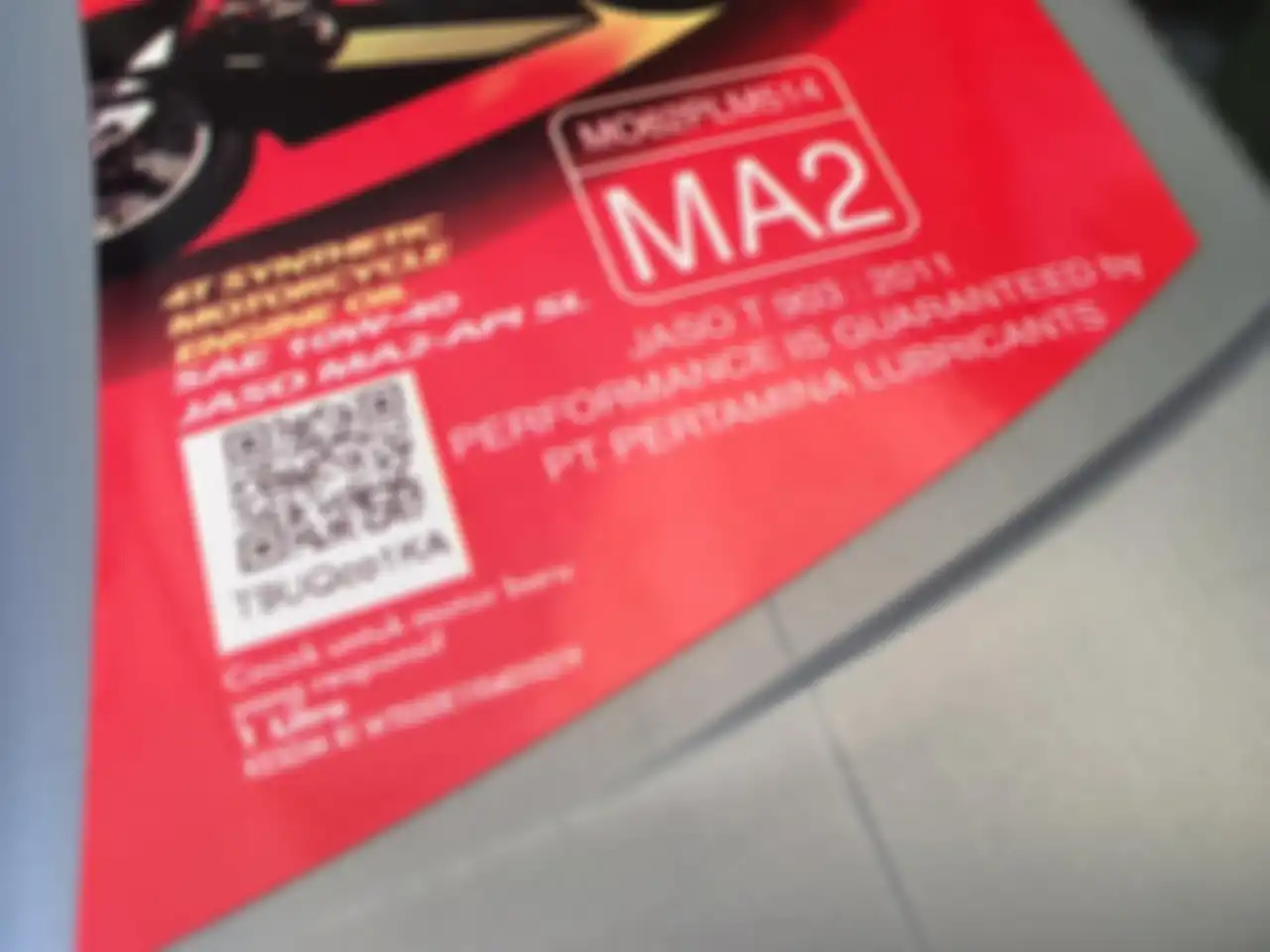 Barcode yang bisa discan pada botol oli