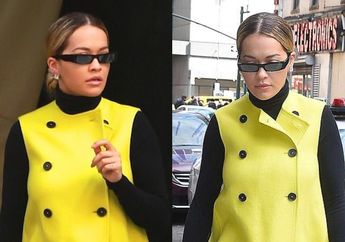Nyentrik Banget, Rita Ora Tampil dengan Balutan Coat Berwarna Kuning Mencolok
