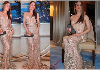Cinta Laura Tampil Anggun Seksi dengan Gaun Strapless Nuansa Gold di Pernikahan Raditya Dika