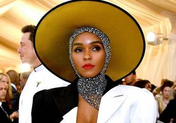 Janelle Monae Tampilkan Gaya Monokrom Seksi dengan Penutup Kepala pada Acara Met Gala 2018