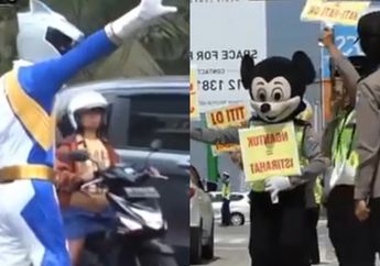 Aksi Lucu Para Petugas Lalu Lintas Untuk Hibur Pemudik Di Solo, Jawa Tengah