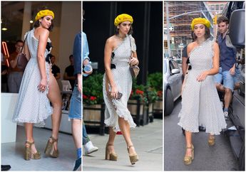 Dress Polkadot Superseksi Dua Lipa yang Makin Stylish dengan Topi Baret Kuning