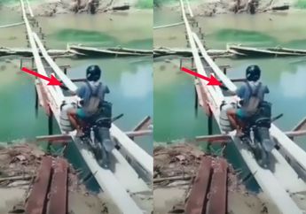 Seorang Pria di Papua Nekat Seberangi Jembatan Kayu Selebar 30 Cm Demi Capai Tujuannya