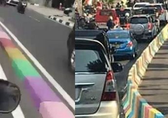 Marka Jalan Berkelir, Netizen : Kue Lapis Terpanjang di Dunia 