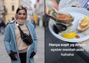Tak Gengsi, Ashanty Suapi ARTnya Makan Tiram Mentah Saat Liburan ke Eropa