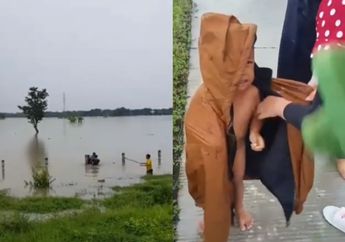 Video Viral, Pengendara Mobil Selamatkan Suami Istri dan 2 Balita yang Terjebak Banjir di Madiun