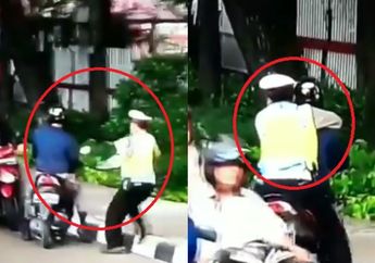 Aksi Polisi Menciduk Pengendara Sepeda Motor yang Lawan Arus Ini Bikin Netizen Salah Fokus