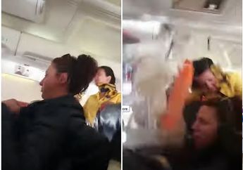 Video Mencekam Pramugari yang Tiba-tiba Terlempar Ke Atas Kabin Pesawat Saat Bawakan Troli Makanan, Penumpang Sampai Tersiram Air Panas