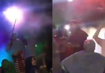 Sosok Emak-emak Viral Setelah Lakukan Aksi Joget Musik Remix di Tengah Kerumunan Sambil Tenteng Senapan Laras Panjang