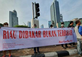 Bentangkan Spanduk 'Riau Dibakar Bukan Terbakar' Warga Minta Presiden Jadikan Kabut Asap Jadi Bencana Nasional
