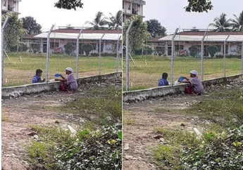 Dilarang Masuk Sekolah Saat Hendak Berikan Bekal Makan Siang untuk Cucunya, Nenek Ini Rela Duduk Jongkok di Luar Pagar