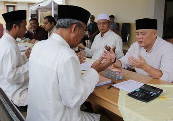 Panduan Bayar Zakat di Tengah Pandemi Corona, Masihkan Harus Berjabat Tangan?