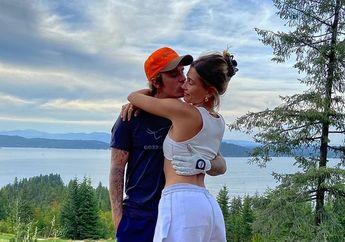 Bersama Sang Istri, Justin Bieber Bagikan Potret Sakral Prosesi Pembabtisan