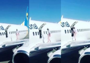 Lagaknya Bagai Orang Tak Berdosa, Ibu Dua Anak Gegerkan Satu Bandara Gegara Buka Pintu Darurat Pesawat Lalu Jalan-jalan Santai di Sayapnya