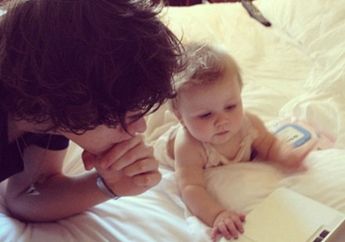 One Direction Member with Baby Lux