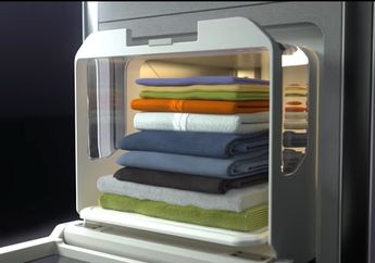 Wih Canggih, Mesin Cuci Ini Bisa Menyetrika dan Melipat Baju Sendiri loh