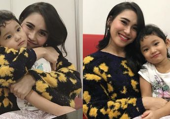 Kompak Pakai Serba Kuning, Intip Gaya Ayu Ting Ting dengan Sang Buah Hati di Airport