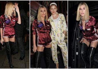 Hailey Baldwin Tampil Nyentrik dan Seksi dengan Playsuit dan Sepatu High Boots di Pesta Women&rsquo;s Tales Miu Miu di London