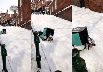 Demi Kepuasan Pelanggan, Kurir Makanan Rela Berseluncuran di Atas Tumpukan Salju