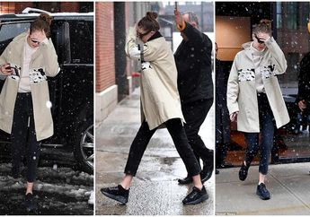Tetap Stylish! Gaya Busana Gigi Hadid dengan Coat Mewah Warna Beige Saat Badai Salju