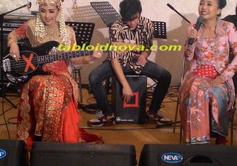 Sang Pembetot Bass Itu Beraksi dengan Pakaian Pengantin