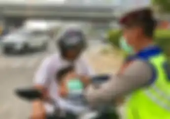 Bikers Wajib Catat! Jangan Turunkan Masker ke Dagu, Begini Alasannya..