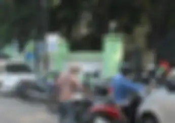 Ada Tulisan Ini Tukang Parkir Liar Jangan Coba-coba Minta Uang ke Pemotor, Bisa Dipenjara 9 Tahun