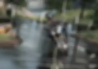 Enggak Sembarangan, Begini Teknik Menikung Saat Naik Motor di Jalan Basah
