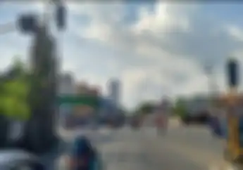 Terungkap! Ini Alasan Biker Wajib Kendorin Gas Motor Saat Melintas di Persimpangan 