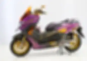 Aplikasi Perpaduan Warna Emas dan Ungu, Yamaha NMAX Ini Sabet Gelar di Customaxi Makassar