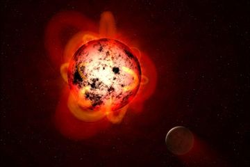 Ilustrasi bintang katai merah yang diorbit oleh planet ekstrasurya hipotetis. Katai merah meletus dengan suar intens yang dapat melucuti atmosfer planet terdekat dari waktu ke waktu, atau membuat permukaannya tidak ramah bagi kehidupan seperti yang kita kenal.